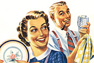 50's couple washing and drying dishes.